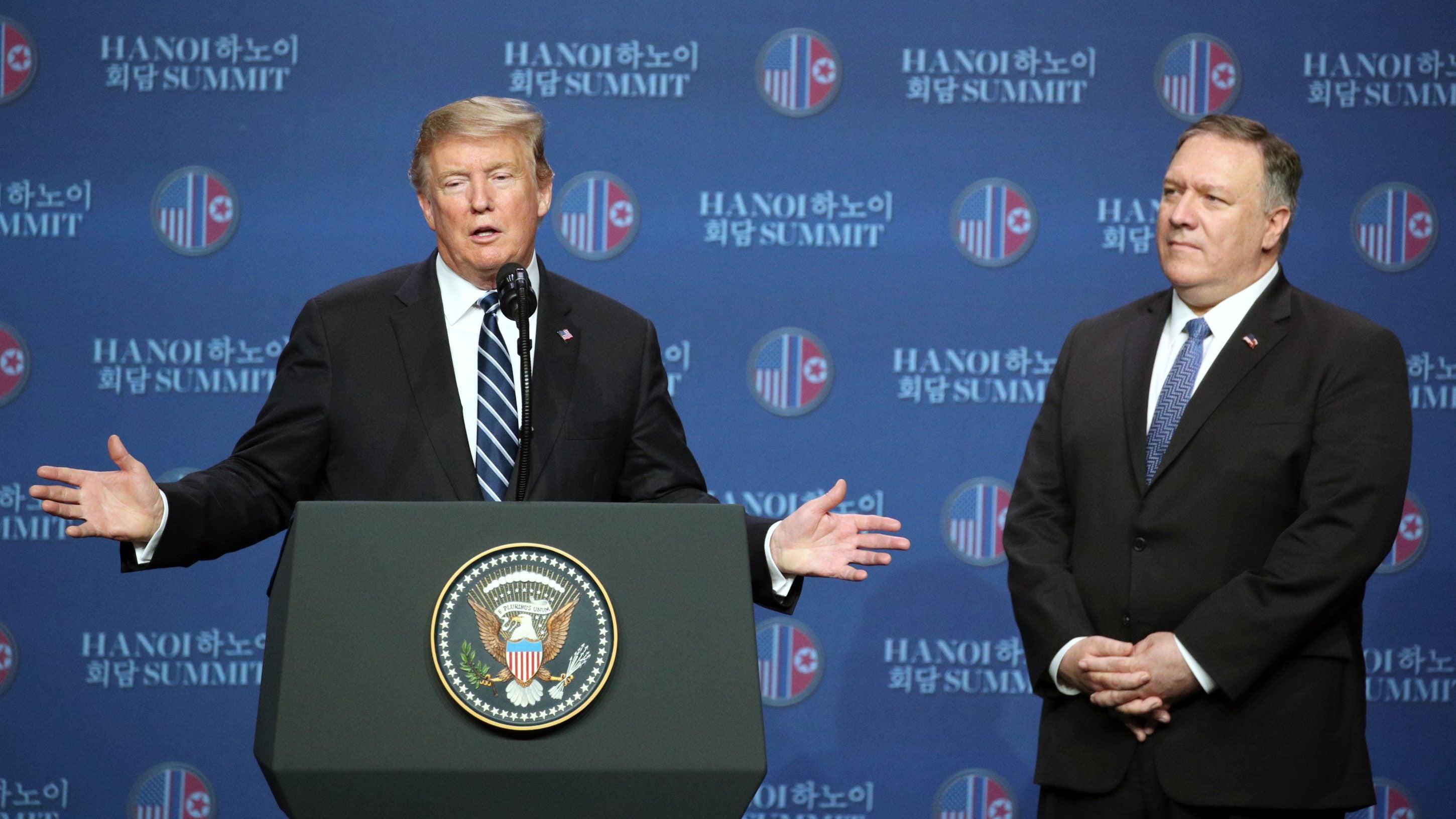 U.S. President Donald Trump, left, gestures as he speaks as Mike Pompeo, U.S. secretary of state, looks on during a news conference following the DPRK-USA Hanoi Summit in Hanoi, on Thursday. Trump's second summit with Kim collapsed Thursday without an agreement between the two leaders, plunging future talks on North Korea's nuclear program into question.