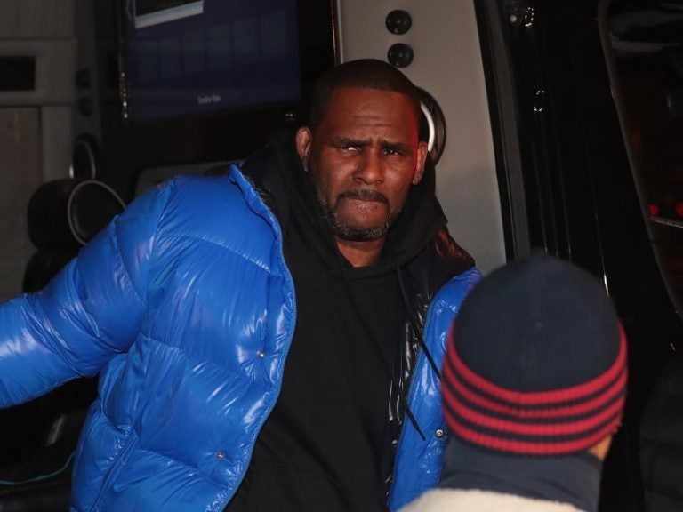 R. Kelly turns himself in at Chicago’s 1st District-Central police station on Friday evening. Earlier that day, Kelly was indicted on 10 counts of aggravated criminal sexual abuse. R. Kelly turns himself in at Chicago's 1st District-Central police station on Friday evening. Earlier that day, Kelly was indicted on 10 counts of aggravated criminal sexual abuse. (Scott Olson/Getty Images)