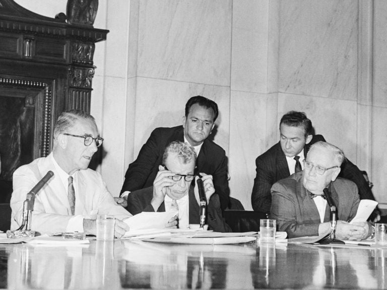 Sen. Estes Kefauver, D-Tenn., (left) and Sen. Everett Dirksen, R-Ill., (second from left) clashed at the reopening of a Senate drug investigation in 1960 over whether witnesses could be forced to reveal business secrets while testifying. (Bettmann Archive/Getty Images)