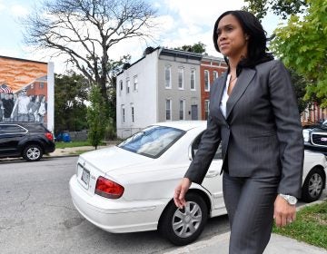 Baltimore State's Attorney Marilyn Mosby walks through a city neighborhood on August 24, 2016. (Larry French/Getty Images)