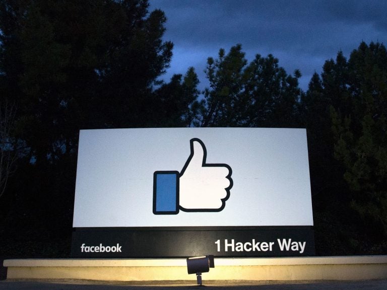 A sign at the entrance to Facebook's corporate headquarters in Menlo Park, Calif. Advocacy groups are asking the Federal Trade Commission to open an investigation into Facebook practices that let children make in-game purchases without their parents' permission.
(Josh Edelson/AFP/Getty Images)