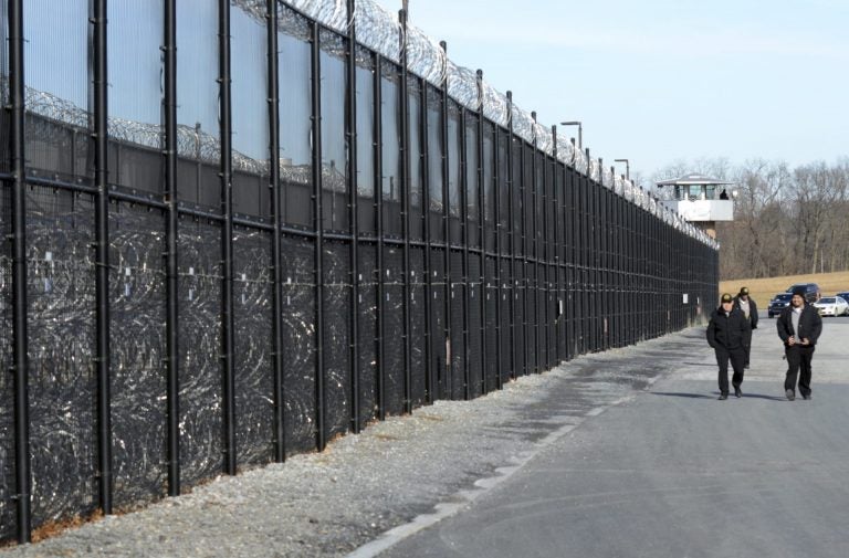 Corrections officers arrive for a shift at the State Correctional Institution at Camp Hill, Pennsylvania. (Marc Levy/AP)