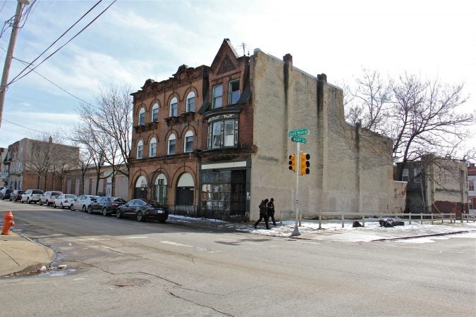 The former home of artist Dox Thrash is in a state of disrepair at the corner of Cecil B. Moore Avenue and 24th Street. (Emma Lee/WHYY)