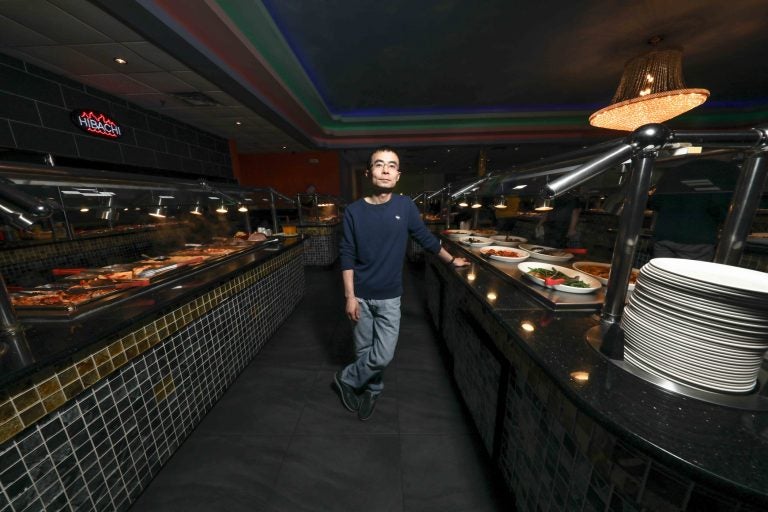 Guang Chen, who also owns Hibachi Grill & Supreme Buffet in Glasgow, is planning to open a restaurant near Newark where robots will seat and serve patrons. (Saquan Stimpson for WHYY)