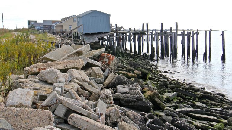 Rocks and the bay are seen along Bay Point