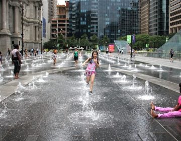 Children play in Dilworth Park in March.  (Emma Lee/WHYY)