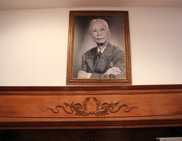 A portrait of Dr. Philip Jaisohn, the first Korean-American to receive a U.S. medical degree, hangs above the mantle at his home in Media, Pa.  The home is now a museum chronicling Jaisohn's life and his involvement in the Korean indepencence movement. (Emma Lee/WHYY)