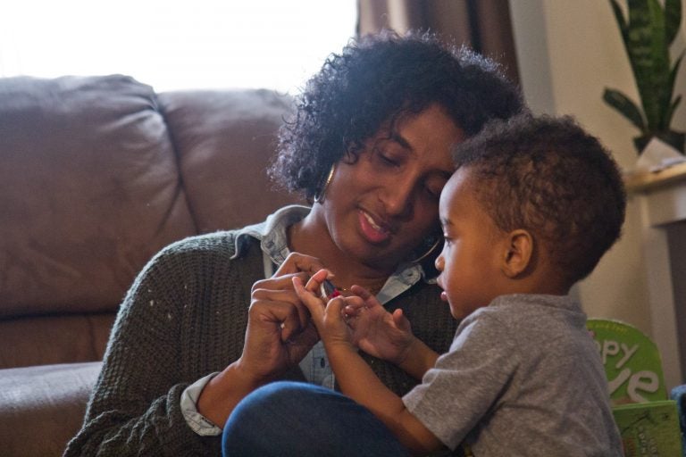 Stephanie Lee remembers the period after her son Santeno, 2, was born. (Kimberly Paynter/WHYY)