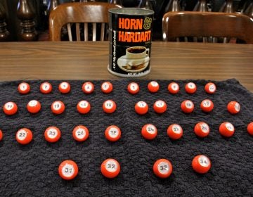 The method of determining ballot position in Philadelphia involves 34 numbered balls and a Horn & Hardart coffee can. (Emma Lee/WHYY)