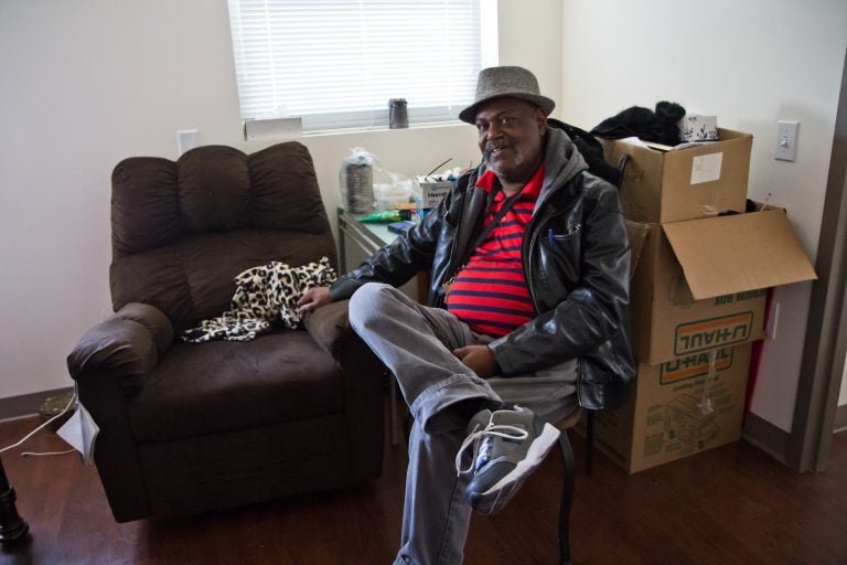 Ricardo Wilson moved into his unit in the new Sharswood Tower in North Philadelphia this week. (Kimberly Paynter/WHYY)