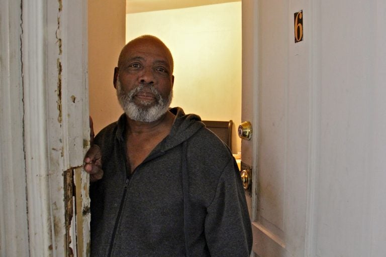 James Smith Jr. rents a room in Victor Pickney's rooming house. (Emma Lee/WHYY)