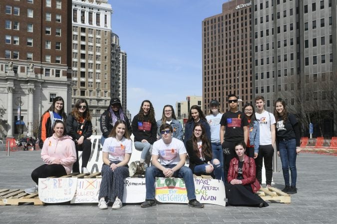 Students, and those who lost loved ones participate in an anti-gun violence rally at LOVE Park, exactly one year after the nationwide student-led protests to call for gun reform following the mass shooting in Parkland, Florida. (Bastiaan Slabbers for WHYY)