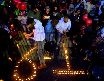 Hundreds of fans, friends and family mourn at a vigil for battle rapper Akeem Mickens (professionally known as Tech9) at the Happy Hollow playground, in the Germantown section of Philadelphia on Tuesday Jan 26, 2019. (Bastiaan Slabbers for WHYY)