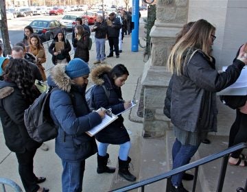 Students and faculty at Temple University line up outside Mitten Hall for free mumps vaccinations. The university scheduled two vaccination clinics after a mumps outbreak sickened more than 100. (Emma Lee/WHYY)