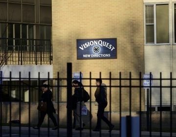 Several VisionQuest employees are seen departing in small groups from the North Broad Streetlocation to join other employees and members of the community at a March 2019 meeting at the nearby Old York House. (Bastiaan Slabbers for WHYY)