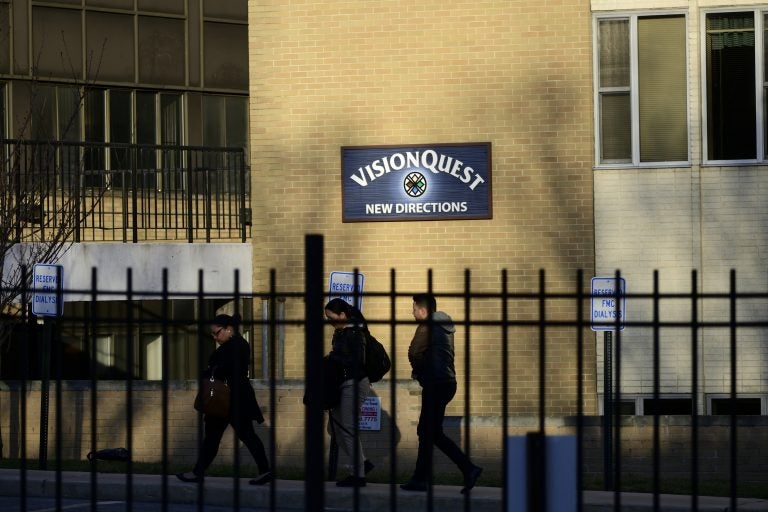 Several VisionQuest employees are seen departing in small groups from the North Broad Streetlocation to join other employees and members of the community at a March 2019 meeting at the nearby Old York House. (Bastiaan Slabbers for WHYY)