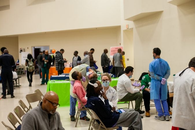 Temple University's School of Dentistry provides oral checkups to men at the 2019 Men's Health Initiative at Enon Tabernacle Baptist Church Saturday. (Brad Larrison for WHYY)