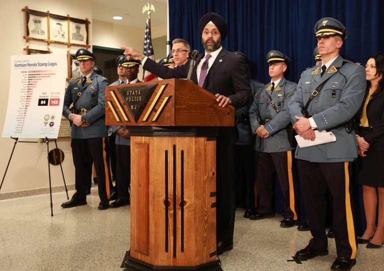 Attorney General Gurbir Grewal, New Jersey State Police Captain Gregory Demeter and U.S. Homeland Security Investigations Assistant Special Agent in Charge Brett Dreyer announce the arrests of three men in the takedown of a major fentanyl and heroin mill, in Harrison, N.J., that distributed its narcotics in wax folds stamped with the same brand names that have been linked to 227 overdoses, including 84 deaths, in Newark, N.J. on Thursday, March 21, 2019. (Tim Larsen/Office of the Attorney General)