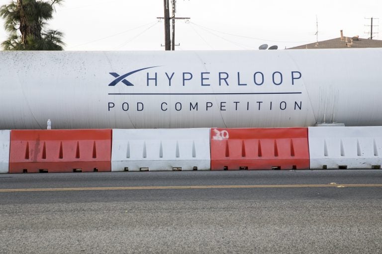 A logo sign on a Hyperloop test track outside of the headquarters of Space Exploration Technologies Corp., also known as SpaceX, in Hawthorne, California, on December 10, 2017. (Kristoffer Tripplaar/Sipa USA via AP Images)