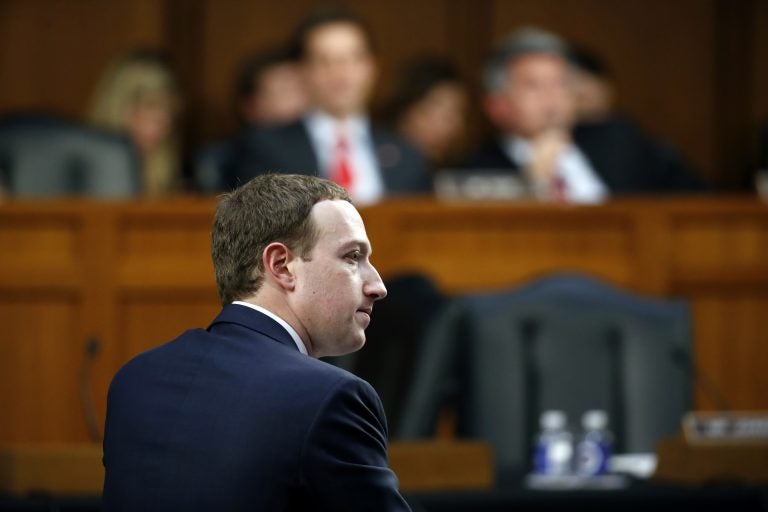 Facebook CEO Mark Zuckerberg testifies before a joint hearing of the Commerce and Judiciary Committees on Capitol Hill in Washington, Tuesday, April 10, 2018, about the use of Facebook data to target American voters in the 2016 election. (Alex Brandon/AP Photo)