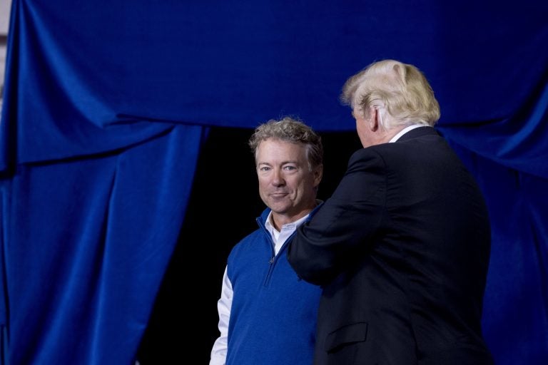 In this file photo, Sen. Rand Paul, R-Ky., is brought up on stage by President Donald Trump as he takes the stage at a rally at Alumni Coliseum in Richmond, Ky., Saturday, Oct. 13, 2018. (Andrew Harnik/AP Photo)