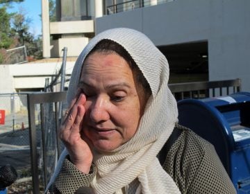 Shamim Rahman, the mother of Adnan Syed, wipes away a tear outside the Maryland Court of Appeals on Thursday, Nov. 29, 2018, in Annapolis, Md., after attending arguments in Maryland's highest court reviewing a decision that could reinstate Syed's conviction for the slaying of his high school sweetheart. The high-profile case was chronicled in the hit 