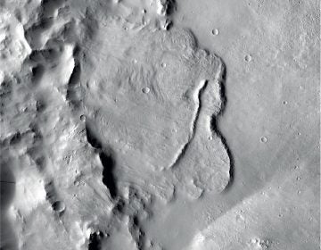 This undated photo provided by the European Space Agency, ESA, shows the surface of the Mars. Scientists say images of Martian craters taken by European and American space probes show there likely once was a planet-wide system of underground lakes. (NASA/JPL-Caltech/MSSS via AP)