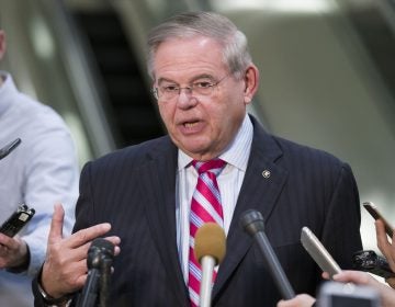 Sen. Menendez speaks at a podium.