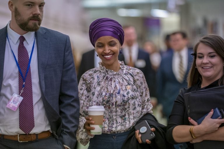 Rep. Ilhan Omar, D-Minn., walks through an underground tunnel at the Capitol as top House Democrats plan to offer a measure that condemns anti-Semitism in the wake of controversial remarks by the freshman congresswoman, in Washington, Wednesday, March 6, 2019. (J. Scott Applewhite/AP Photo)