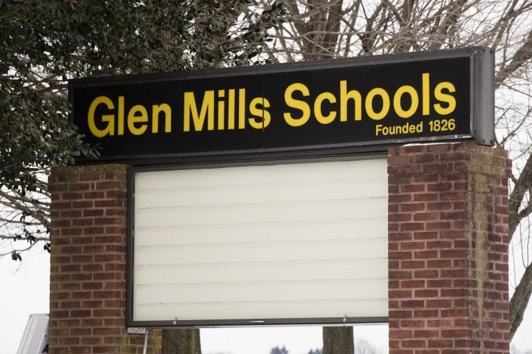 A sign stands outside the Glen Mills Schools in Glen Mills, Pa.