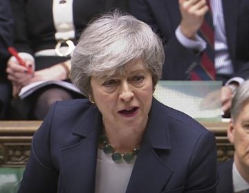 Britain's Prime Minister Theresa May speaks during Prime Minister's Questions inside the House of Commons in London, Wednesday March 13, 2019. (House of Commons/PA via AP)