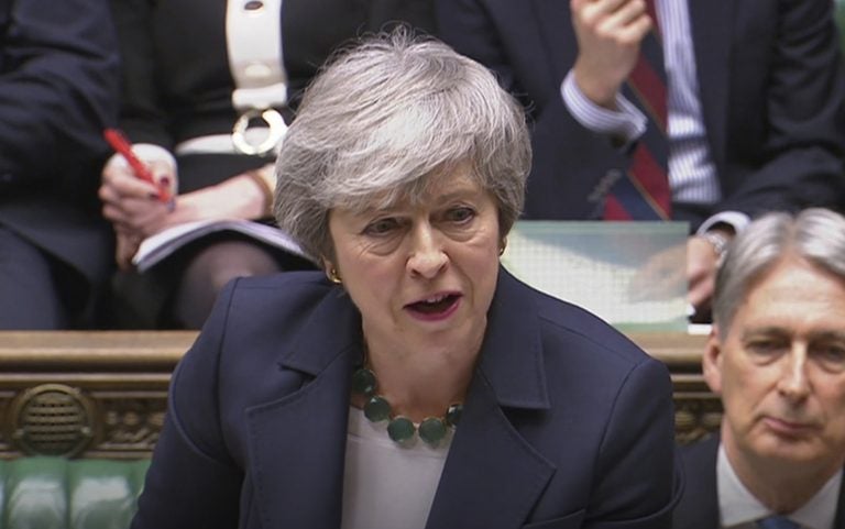 Britain's Prime Minister Theresa May speaks during Prime Minister's Questions inside the House of Commons in London, Wednesday March 13, 2019. (House of Commons/PA via AP)