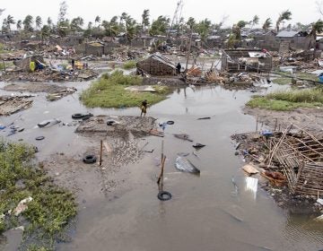 In this photo taken on Friday, March 15, 2019 and provided by the International Red Cross, an aerial view of the destruction of homes after Tropical Cyclone Idai, in Beira, Mozambique. Mozambique's President Filipe Nyusi says that more than 1,000 may have by killed by Cyclone Idai, which many say is the worst in more than 20 years. (Denis Onyodi/IFRC via AP)