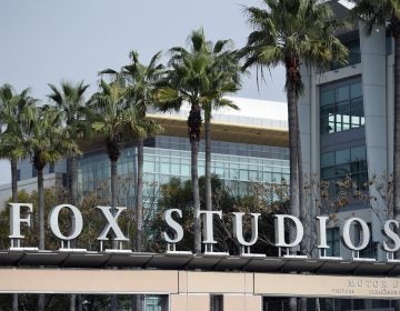The Fox Studios sign is pictured at the entrance to the lot, Tuesday, March 19, 2019, in Los Angeles. Disney's $71.3 billion acquisition of Fox's entertainment assets is set to close around 12 a.m. EDT on Wednesday. (Chris Pizzello/AP Photo)