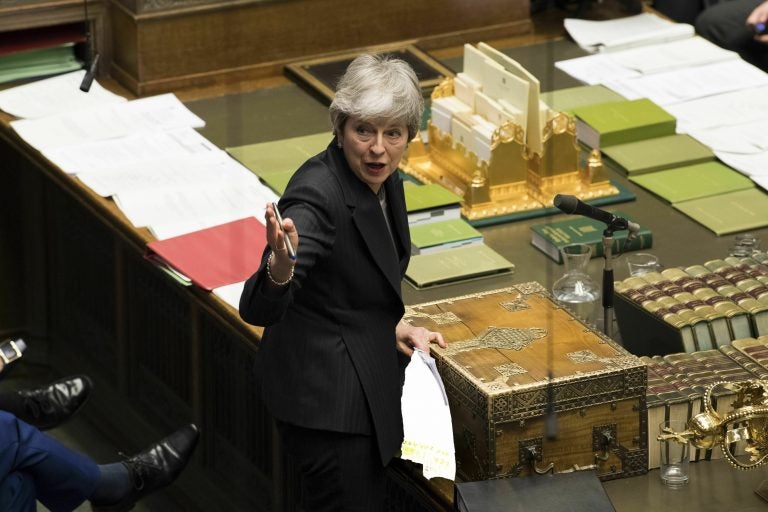 In this handout photo made available by UK Parliament, Britain's Prime Minister Theresa May speaks during Prime Minister's Questions in the House of Commons, London, Wednesday March 20, 2019. Exactly 1,000 days after Britain voted to leave the European Union, and nine days before it is scheduled to walk out the door, Prime Minister Theresa May hit the pause button Wednesday, asking the bloc to postpone the U.K.'s departure until June 30. (UK Parliament/Mark Duffyvia AP)