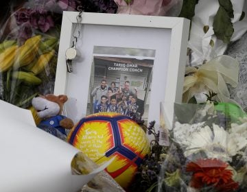 A tribute for mosque shooting victim Tariq Omar is placed at the Botanical Gardens in Christchurch, New Zealand, Thursday, March 21, 2019. Thousands of people were expected to come together for an emotional Friday prayer service led by the imam of one of the two New Zealand mosques where 50 worshippers were killed in a white supremacist attack on Friday March 15. (Mark Baker/AP Photo)