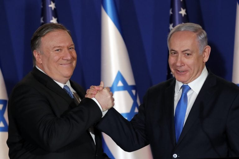 U.S. Secretary of State Mike Pompeo shake hands with Israeli Prime Minister Benjamin Netanyahu, during their visit at Netanyahu's official residence in Jerusalem, Thursday March 21, 2019. (Jim Young/Pool Image via AP)