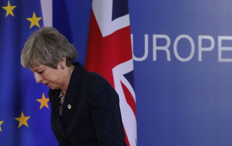 British Prime Minister Theresa May leaves after addressing a media conference at an EU summit in Brussels, Friday, March 22, 2019. Worn down by three years of indecision in London, EU leaders on Thursday were grudgingly leaning toward giving the U.K. more time to ease itself out of the bloc. (Frank Augstein/AP Photo)