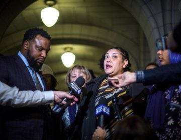 Rose family attorney, S. Lee Merritt, (left), and Michelle Kenney, (center), mother of Antwon Rose II, address members of the media following the closing arguments in the homicide trial of former East Pittsburgh Police officer Michael Rosfeld, Friday, March 22, 2019, at the Allegheny County Courthouse in Pittsburgh. (Nate Smallwood/Pittsburgh Tribune-Review via AP, Pool)