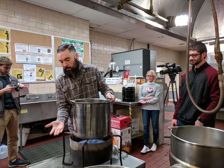 Brad Moyer goes over the beginning steps of home brewing during a class at Shippensburg University.
(Rachel McDevitt/WITF)