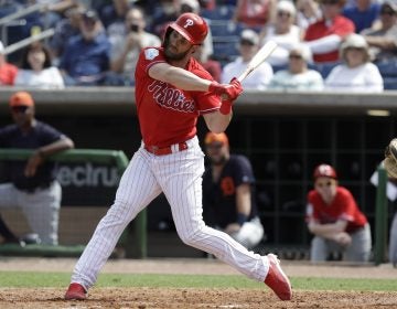 Philadelphia Phillies' Bryce Harper bats against the Detroit Tigers during the seventh inning of a spring training baseball game Wednesday, March 20, 2019, in Clearwater, Fla. (AP Photo/Chris O'Meara)