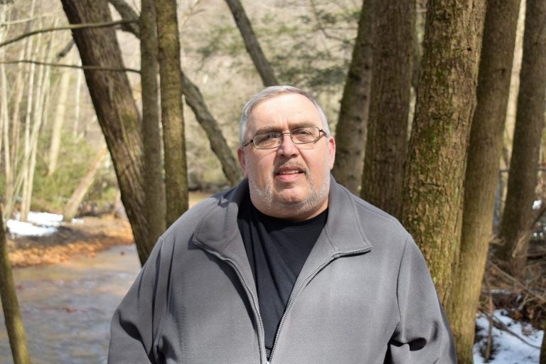 Bob Smith stands in the backyard of his home in Schuylkill County on March 11, 2019. ( Ed Mahon / PA Post)