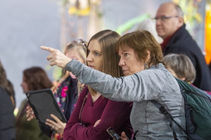 Jennifer Garton (left) and Jan Marcinkevich, from South Jersey, view the competition. (Jonathan Wilson for WHYY)