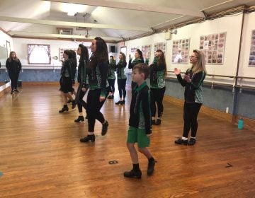 Dancers from the Emerald Isle Academy of Irish Dance prepare for the Philadelphia St. Patrick’s Day Parade on Saturday in Springfield, Pa. (Emily Scott/WHYY, file)