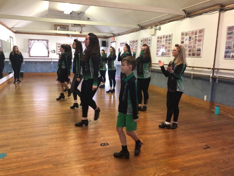 Dancers from the Emerald Isle Academy of Irish Dance prepare for the Philadelphia St. Patrick’s Day Parade on Saturday in Springfield, Pa. (Emily Scott/WHYY, file)