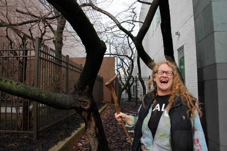 This Eastern redbud tree outside WHYY studios will bloom in a few weeks, and that thought delights Sally McCabe, associate director of community education at the Pennsylvania Horticultural Society. (Emma Lee/WHYY)