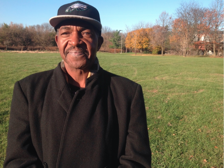 Terry Williams standing in one of Eastwick's polluted, urban renewal tracts.  (Troubled Waters Project)