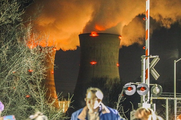 Protesters gather for a vigil outside the north gate of the Three Mile Island nuclear power plant in Londonderry Township, Dauphin County. (Tim Lambert/WITF)