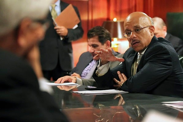 Sen. Vincent Hughes, D-Philadelphia, makes a point as they discuss pension legislation in the Rules Committee ahead of floor debate at the state Capitol in Harrisburg, Pa., Tuesday, June 30, 2015. (Chris Knight/AP Photo)