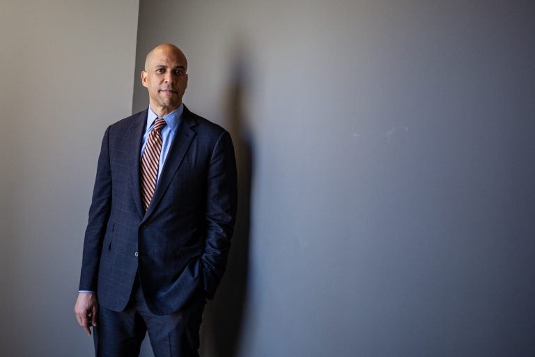 Cory Booker poses for a portrait at NPR headquarters in Washington, D.C. Underlying many of Booker’s points is a belief that it’s possible to create bipartisan consensus, even while the partisan divide in America seems to grow ever wider. Cory Booker poses for a portrait at NPR headquarters in Washington, D.C. Underlying many of Booker's points is a belief that it's possible to create bipartisan consensus, even while the partisan divide in America seems to grow ever wider. (Amr Alfiky/NPR)